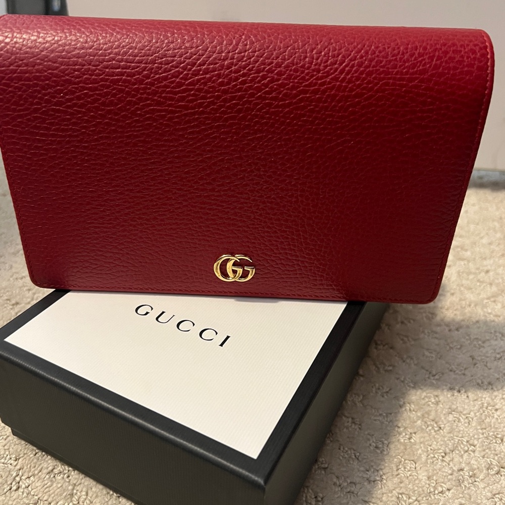 Red Gucci clutch with gold long chain. Perfect condition